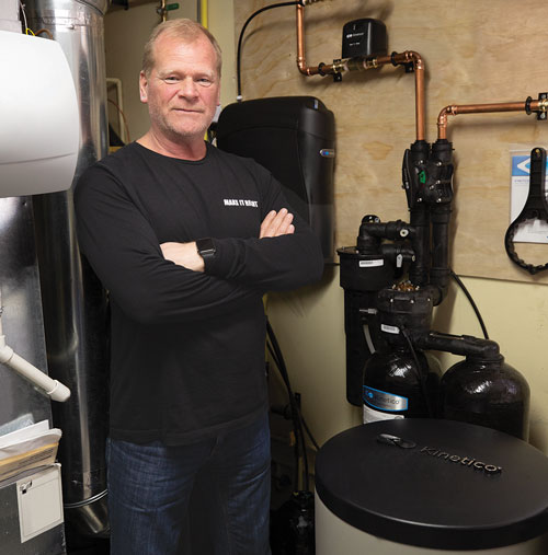 Mike Holmes with his Kinetico water treatment system