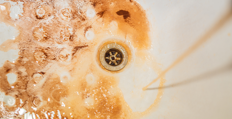 rust colored water